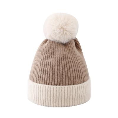 China COMMON Pom Poms Thick Winter Girls Beanie Hats Custom Knitted Fur Ball Beanie Hat For Women for sale