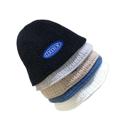 China JOINT adult ladies warm and soft handfeel with patch embroidery knit fisherman hat for winter season for sale