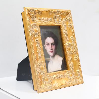 China Simple European Baroque Classic Wooden Frame Light Gold Style Picture Luxury Picture Frame for sale