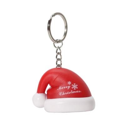 China Plastic Christmas Theme Hat Shape LED Light And Christmas Song Music Playing Key Chain For Christmas Gifts for sale