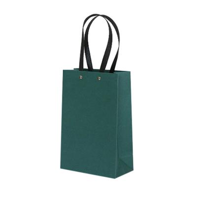 China Recycled Materials Modern Design Custom Printed Logo Paper Bag Luxury Gift Paper Shopping Bag for sale