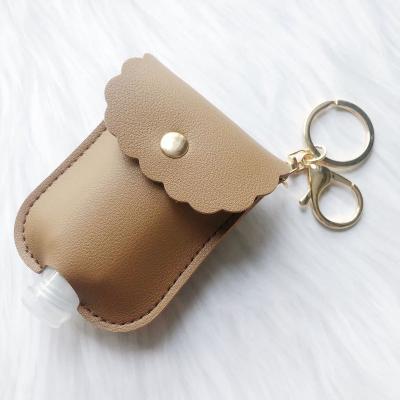 China Fashionable Key Ring Reusable Lotion Squeeze Tube Soap Containers Leather Pockets Travel Accessories Hand Sanitizer Bottle Key Chain Holder YSK013-2 for sale