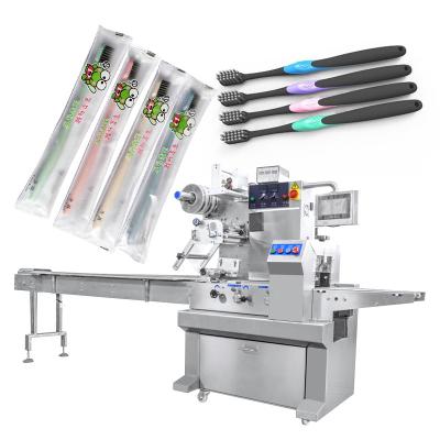 China Automatic Toothbrush Toothpick Package Flow Wrap Food OEM Fruit Packing Packing Machine for sale