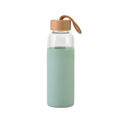 China Viable Single Layer Glass 500ml Water Bottle With Silicone Sleeve Lid Sublimation Glass Silicone Bamboo Water Bottle for sale