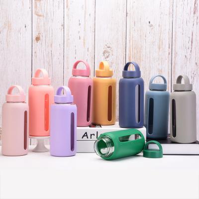 China 2022 new viable hot sales 800ml glass bottles drinking bottled water bottle with silicone sleeve large capacity portable cup with handle for sale