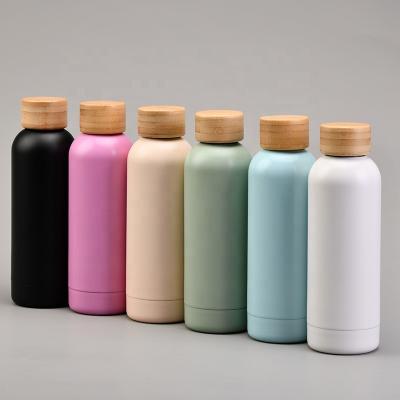 China Eco Friendly Sustainable 500ml Double Wall Vacuum Insulated Water Bottle Powder Matte Bottle Stainless Steel Custom Cup With Bamboo Lid for sale