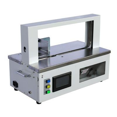 China Hot Sale Desktop Strapping Machine For Packaging And Bundling for sale