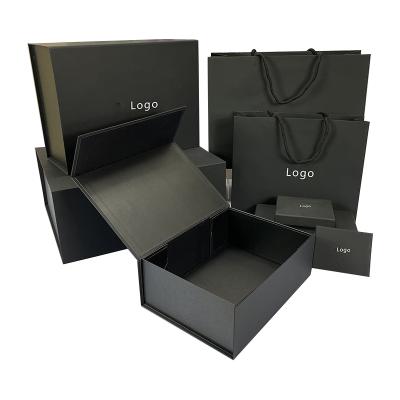 China Recyclable Wholesale Extra Large Custom Printed Folding Black Cardboard Clothes Packaging Gift Box With Magnetic Lid for sale