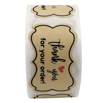 China Waterproof Custom Irregular Kraft Paper Thank You Stickers Roll Up Product Packaging Labels Self Adhesive Seals for sale