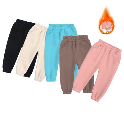 China Autumn Elastic Waist Solid Color Breathable Pants Mow Jogger Pants Cotton Kids Track Pants for sale