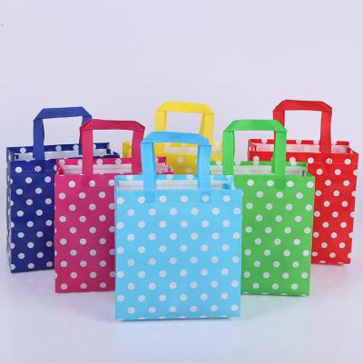 China Eco-Friendly Wholesale Custom Design Grocery Gifts Promotional Gift Nonwoven Party Carry Bags for sale