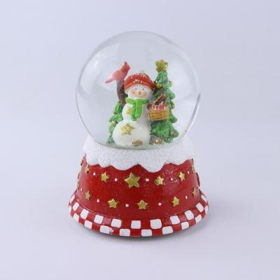 China Resin Fireplace Resting Santa Claus 100MM Resin Christmas Water Snow Globe Play Holiday Song for sale