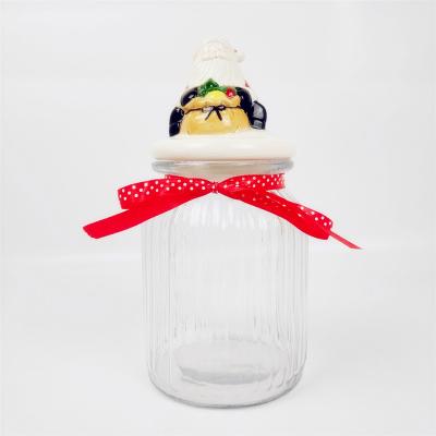 China Large Viable Glass Airtight Jar with Santa Claus Ceramic Cover for sale