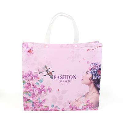 China 2021 Promotional Shopping Bag Handled Shopping Tote Handle Gift Bag Stylish New Amazona Style Shiny Nonwoven Reusable Grocery Shopping Bag for sale