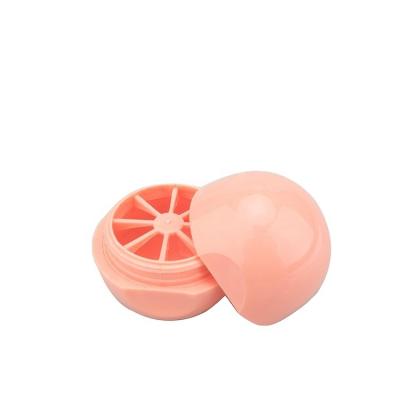 China Cosmetic Good Quality Colorful Ball Shaped Plastic Lip Balm Container Egg Shaped Lip Balm Packaging for sale