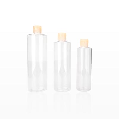 China BEAUTY PACKAGING 100-500ml Transparent Empty PET Plastic Bottle With Flip Lid Cosmetic Bottles for sale