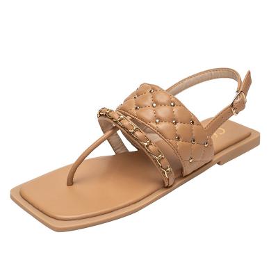 China Hot Fashion Trend Wish Amazon Rivet Slippers Chain Flat-heeled Flat Bottom Women's Sandals Place-toe Casual Women's Flip Flops for sale