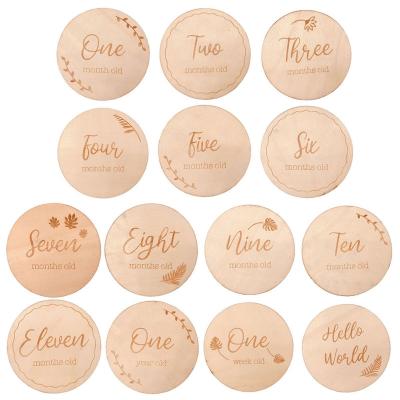 China China Wood Laser Cut and Engraved Monthly Plaques Baby Milestone Cards Discs Set Props Photography Newborn Shower Gifts for sale