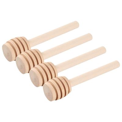 China Free Shipping China Olive Hexagon Mini Beech Ucheom Sticks Glass Bee Shaped Jar With Wooden Lid Honey Dipper Wooden for sale