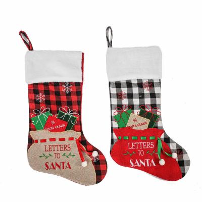 China Eco-Friendly Red Black Buffalo Plaid Christmas Stockings Ornament With Plush Cuff For Family Holiday Xmas Party Decorations for sale