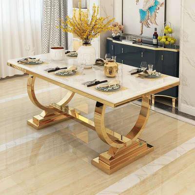 China Convertible Best Selling Modern Elegant Marble Dining Chair King Stainless Steel Dining Table And Chair for sale