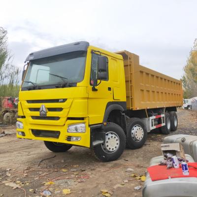 Cina LHD Used Dump Truck Tipper Sinotruk Howo 371 375hp in vendita