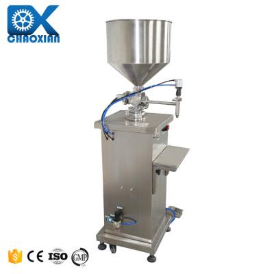 China Milk Fish Food Grout Liquid Bottle Filling Machine Fertilizer Sugar Juce Filling Machine With Tank en venta