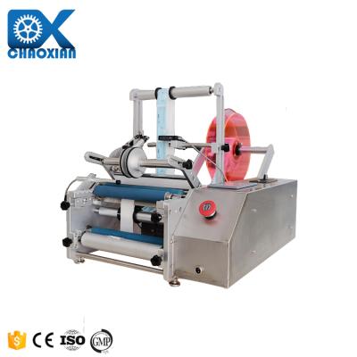 China Semi Automatic Transparent Sticker Round Bottle Labeling Machine For Round Glass Plastic Bottle zu verkaufen