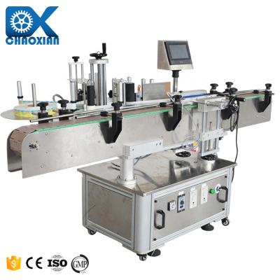 China Rectangular Roll to Roll Wine PVC Sticker Label Micro Dispensing Rolling Labeling Machine 16 Colors for sale