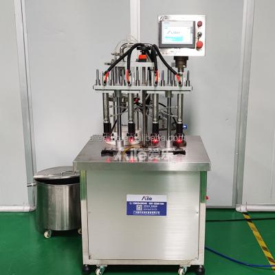 China Durable Wing 4 Heads Semi Automatic Magnetic Perfume Oil Pump Filling Machine Making Line for sale