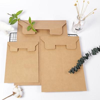 China Business Envelope Logo Printing Mini Brown Kraft Twine and Button Jewelry Necklace Gift Packaging Custom Paper Envelope for sale