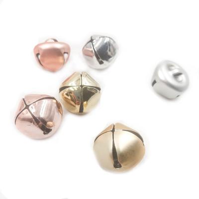 China Nice Quality Iron Fashion Quality Silver Metal Rose Gold Color Mini Small Xmas Jingle Bells Christmas Cross for sale