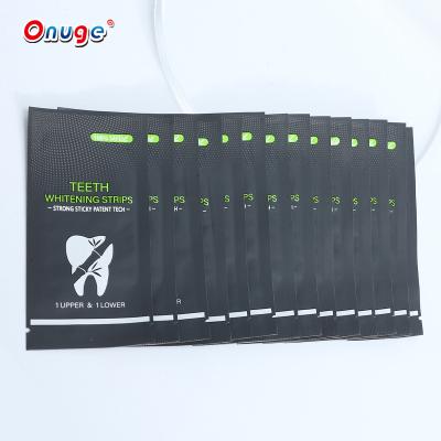 China Healthy Teeth Whitening Cleaning Stain Remove 14 Days Treatment Black Non Peroxide Charcoal Whitening Tooth Strips for sale