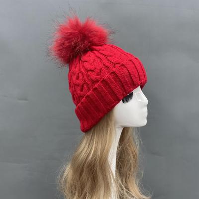 China JOINT winter women kniited raccoon fur pom acrylic warm comfortable braided hats for sale