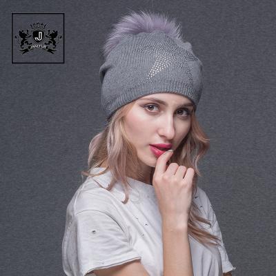 China Women's COMMON pink raccoon fur pom pom beanie hat personalized beanie winter woolen winter hats for sale