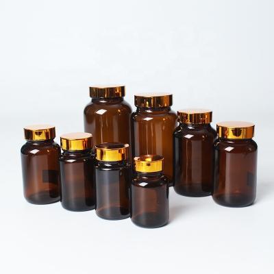 China Eco Friendly Brown Wide Mouth Medicine Pharmaceutical Standard Use Amber Glass Bottle With Plastic Lid For Pill for sale