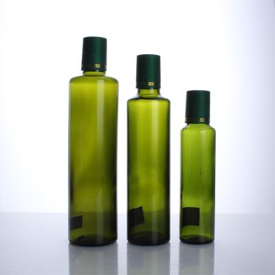 China Eco-Friendly Wholesale Glass Oil Bottle Round Clear Glass Olive Oil Bottles 500ml 1000ml Green Glass Marasca Bottle With Cap Set for sale