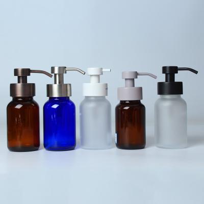 China Eco Friendly High Quality Round 250ml Hand Wash Lotion Glass Bottle With Foam Pump for sale