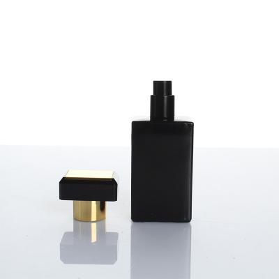 China 30ml 50ml 100ml Factory Eco-Friendly Low Price Selling Gold Square Black Lid Glass Perfume Bottle With Box for sale