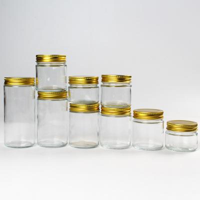 China Empty Clear Round Glass Factory Produced Eco Friendly Food Grade Honey Jar for sale