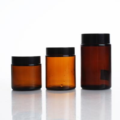 China Eco Friendly Amber Glass Candle Jar Food Grade Glass Cream Jar With Screw Lid for sale