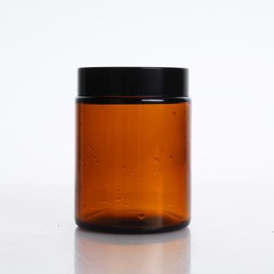 China 100g 150g 200g eco-friendly amber glass body cream jars with plastic lid for sale