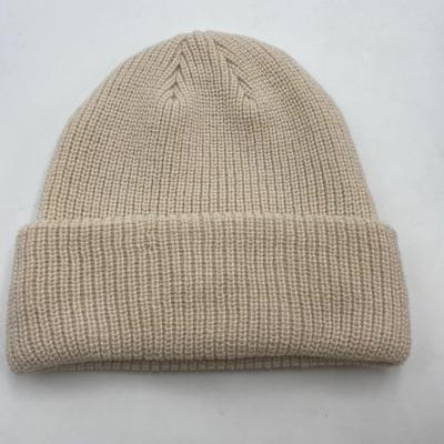 China Wholesale Custom COMMON Logo Unisex High Quality Plain White Dyed Solid Color Winter Hat Acrylic Knitted Slapped Beanie for sale