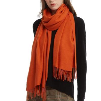 China 2022 New Style 180g Polyester Good Quality Ladies Orange Scarf Made In China Shawl Women Long Scarf With Tassels for sale