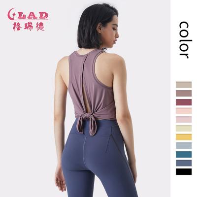 China Dropship Summer Sports High Quality Breathable Soft Loose Crop Gym Yoga Cross Top Woman for sale