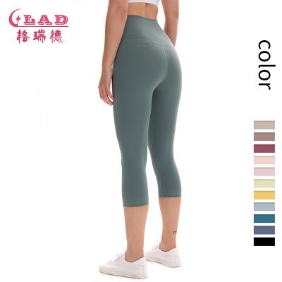 China Breathable Modern Nylon Fitness Waist High Hip Lifting Up Sports Seamless Yoga Pants Women With Pouch for sale