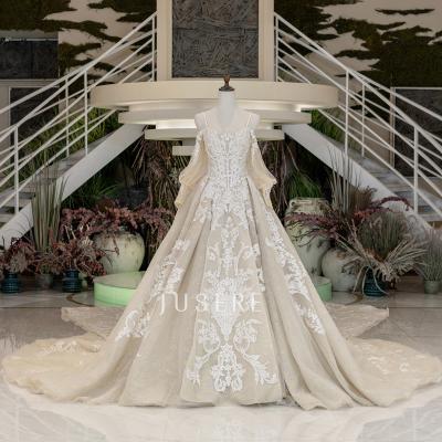 China Luxury Anti-Static Lace Embroidered Lace Train Wedding Dress Removable Heavy Beaded Wedding Dress for sale