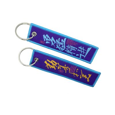 China Polyester Custom Printing Personalized Strap Jet Tag Key Tags Cute Logo Tag Keychains Custom Woven Key Chain for sale