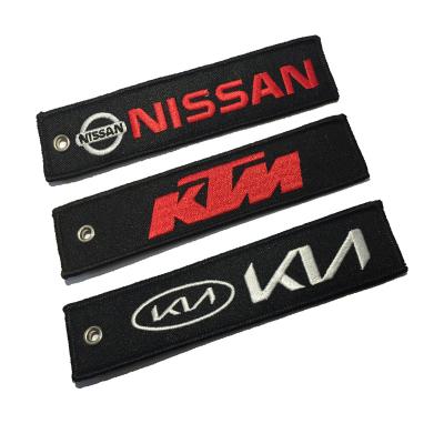 China Hot Sale Polyester Personalized Car Embroidery Key Chain With Logo Fashion Promotional Woven Fabric Key Indicator Custom Key Chain for sale