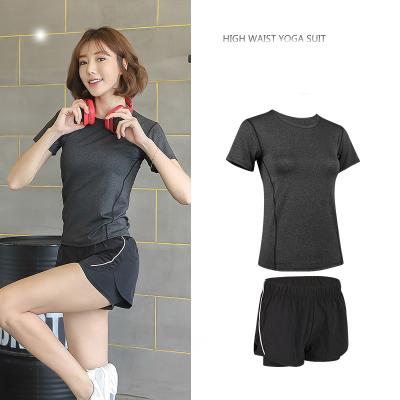 China Women Gym Wear Breathable Sportswear Yoga Suit Moisture Absorbing Running Short Sleeve+Black Shorts Set for sale